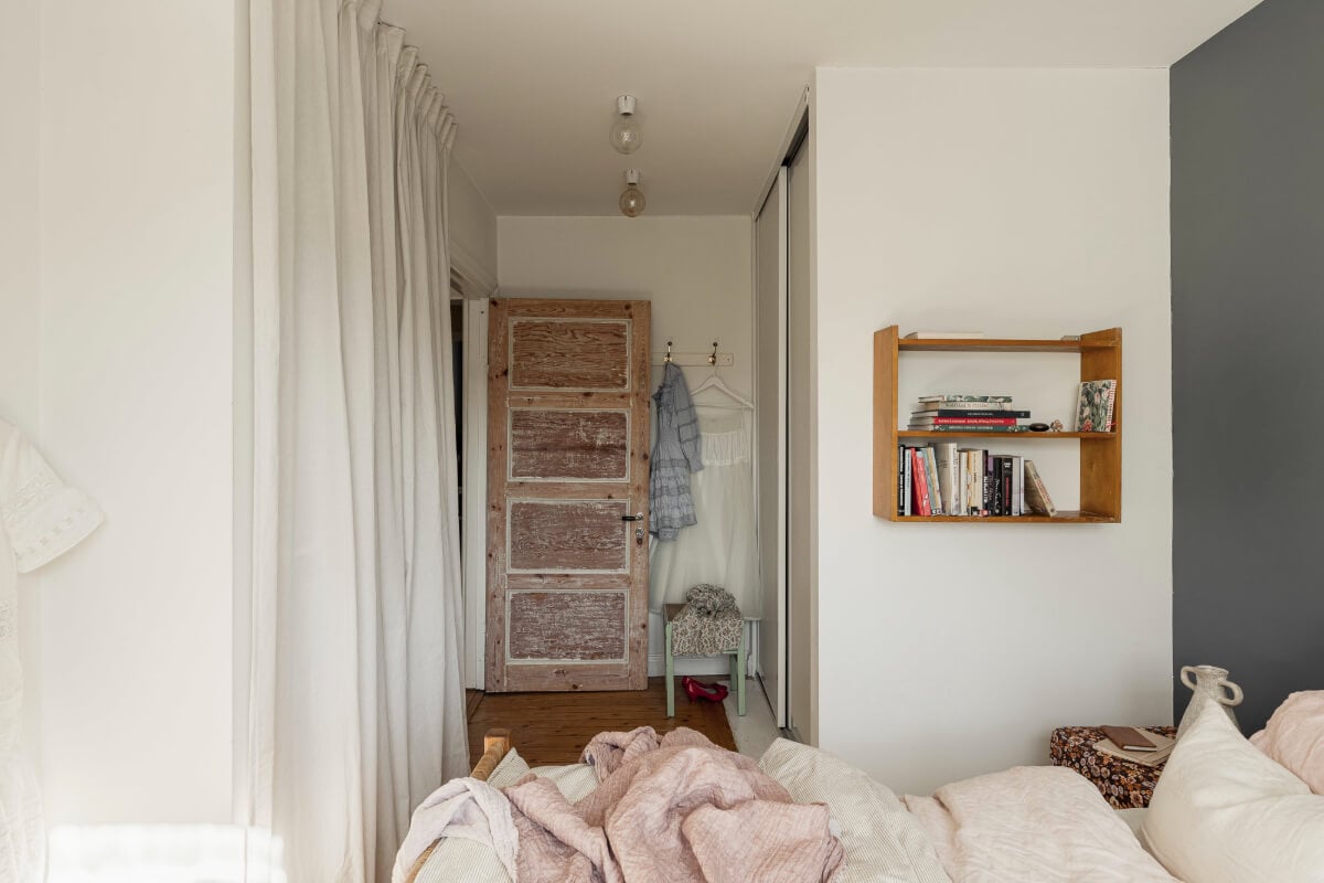 A Swedish Duplex Apartment Inspired by A Danish Summer House 32 bedroom wardrobes behind white curtain