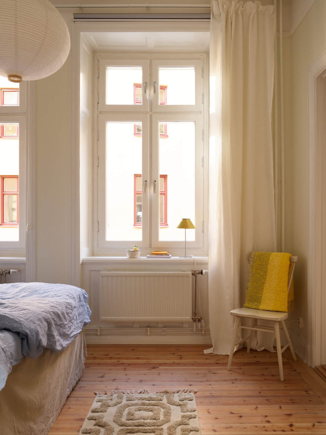 Revisiting a Bright Scandi Apartment with a Gray Kitchen 15 bedroom windows