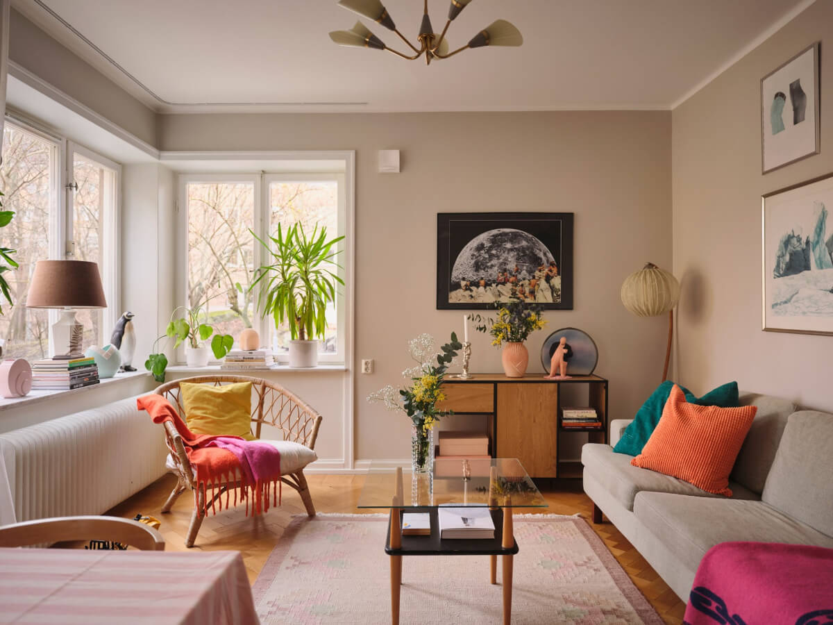 A Corner Apartment with Period Features and Bright Color Pops 1 beige living room bright color accents
