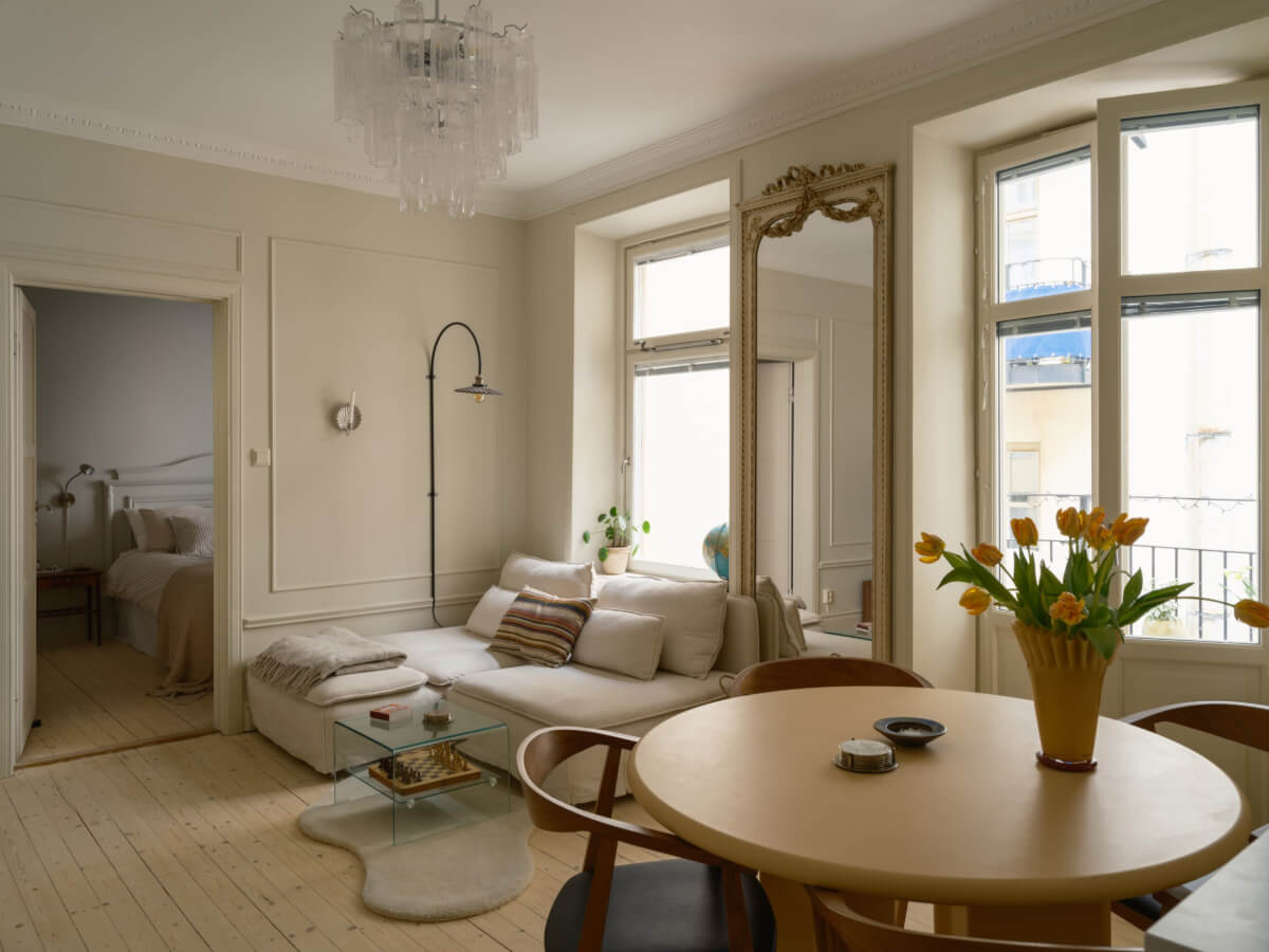 A Serene 19th Century Apartment with a Deep Red Kitchen 1 beige living room wooden floor
