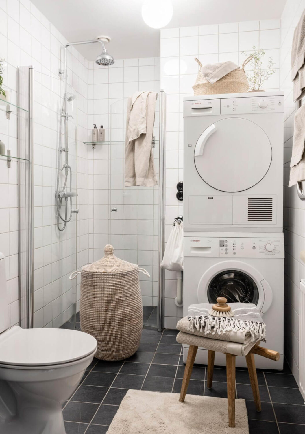 A Light Color Palette in a Stylish Renovated Late 19th Century Apartment 28 black and white bathroom