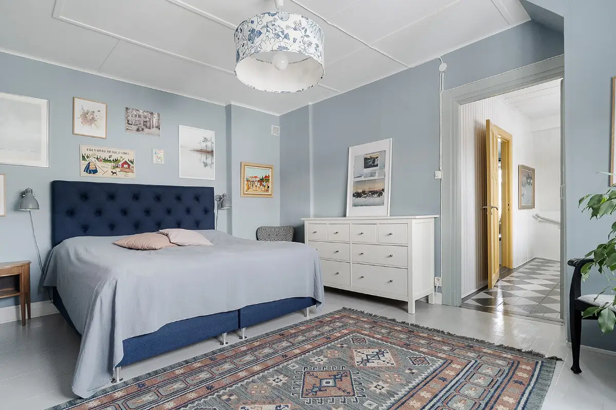 A Charming Early 20th-Century Family Home in Sweden 10 blue bedroom