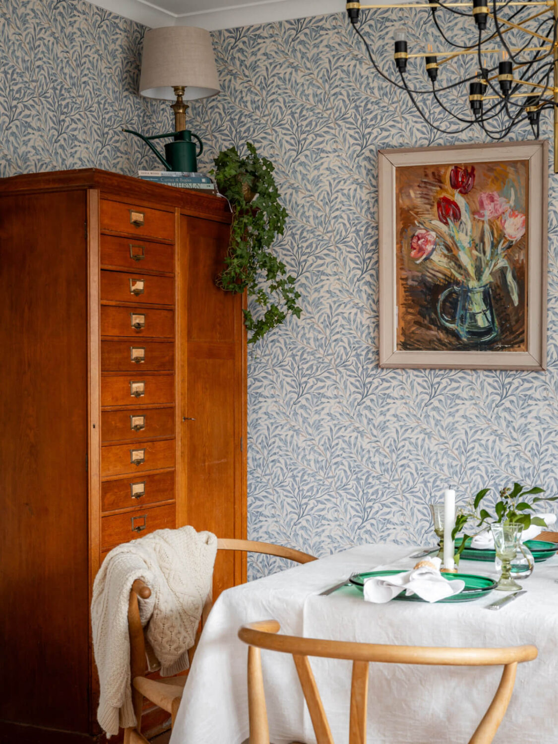 Turn-of-the-Century Charm Meets Modern Comfort in a Swedish House 10 blue william morris wallpaper