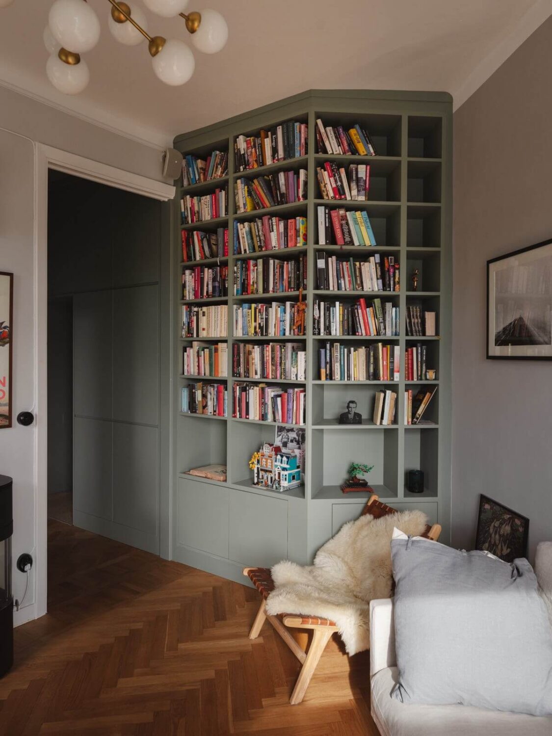 Gray Tones and Built-in Storage in a Charming Corner Apartment 7 built-in bookshelves