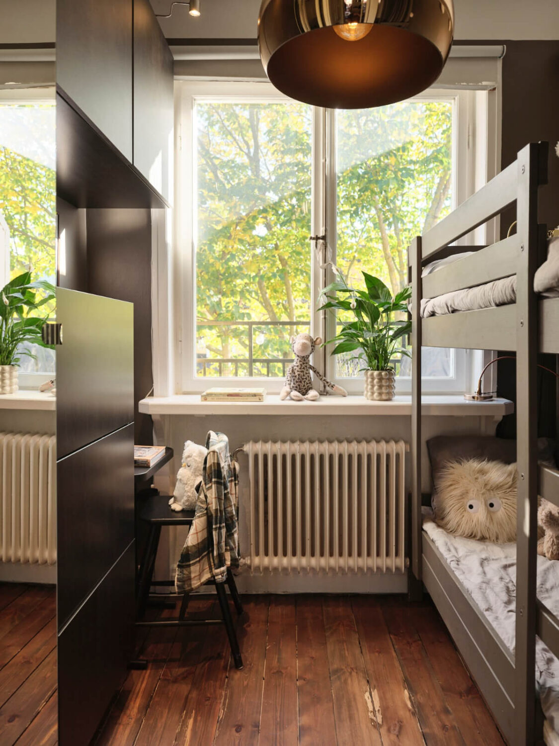 A Light-Filled 1920s Apartment with Two Spacious Balconies 16 dark gray kids bedroom bunk bed