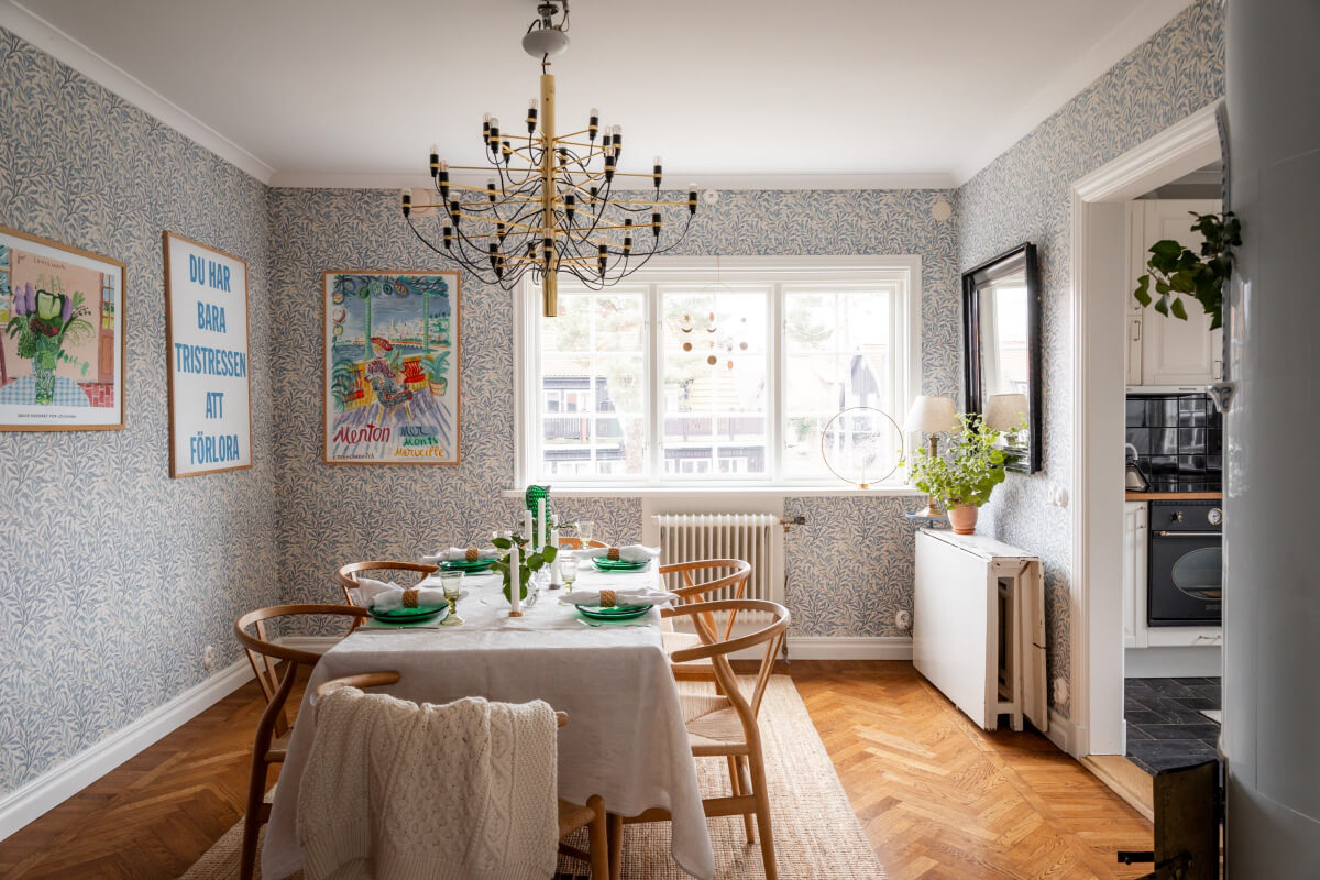 Turn-of-the-Century Charm Meets Modern Comfort in a Swedish House 7 dining room blue wallpaper