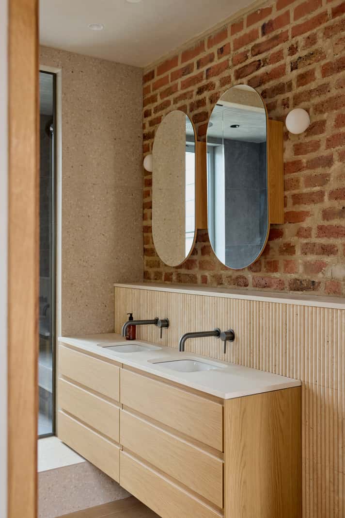 Contemporary Architect-Designed Interiors in a Victorian House 18 double sink brick wall