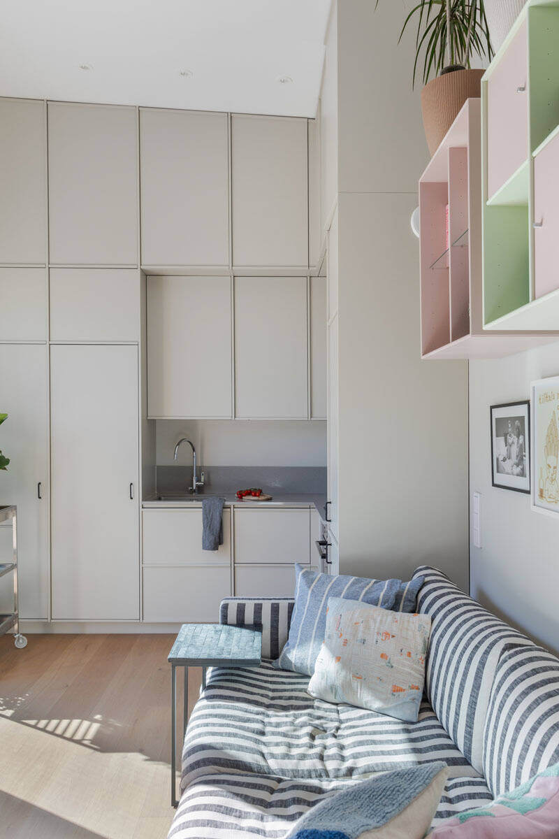A Modern Tiny House in the Swedish Archipelago 8 floor to ceiling kitchen cabinets