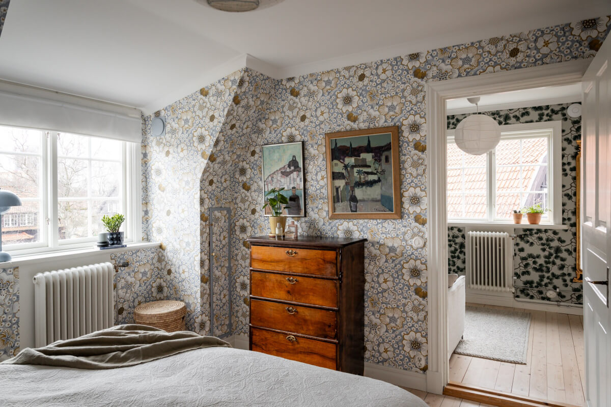 Turn-of-the-Century Charm Meets Modern Comfort in a Swedish House 20 floral wallpaper bedroom