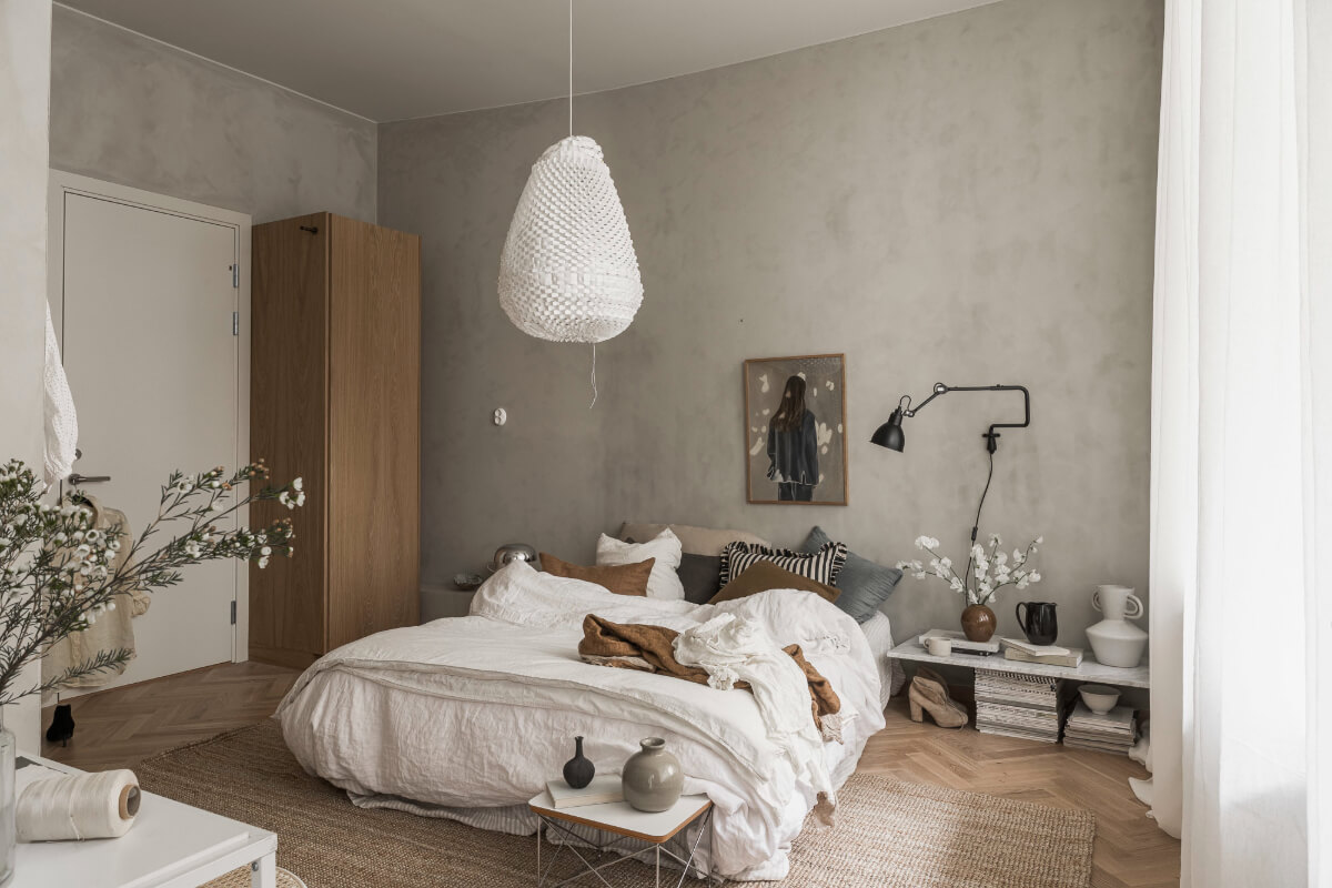 A Light-Filled Contemporary Swedish Apartment 18 gray limewash walls bedroom