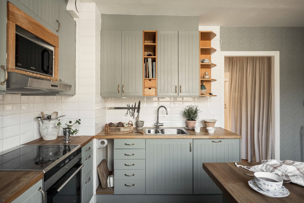 A Swedish Duplex Apartment Inspired by A Danish Summer House 25 green kitchen