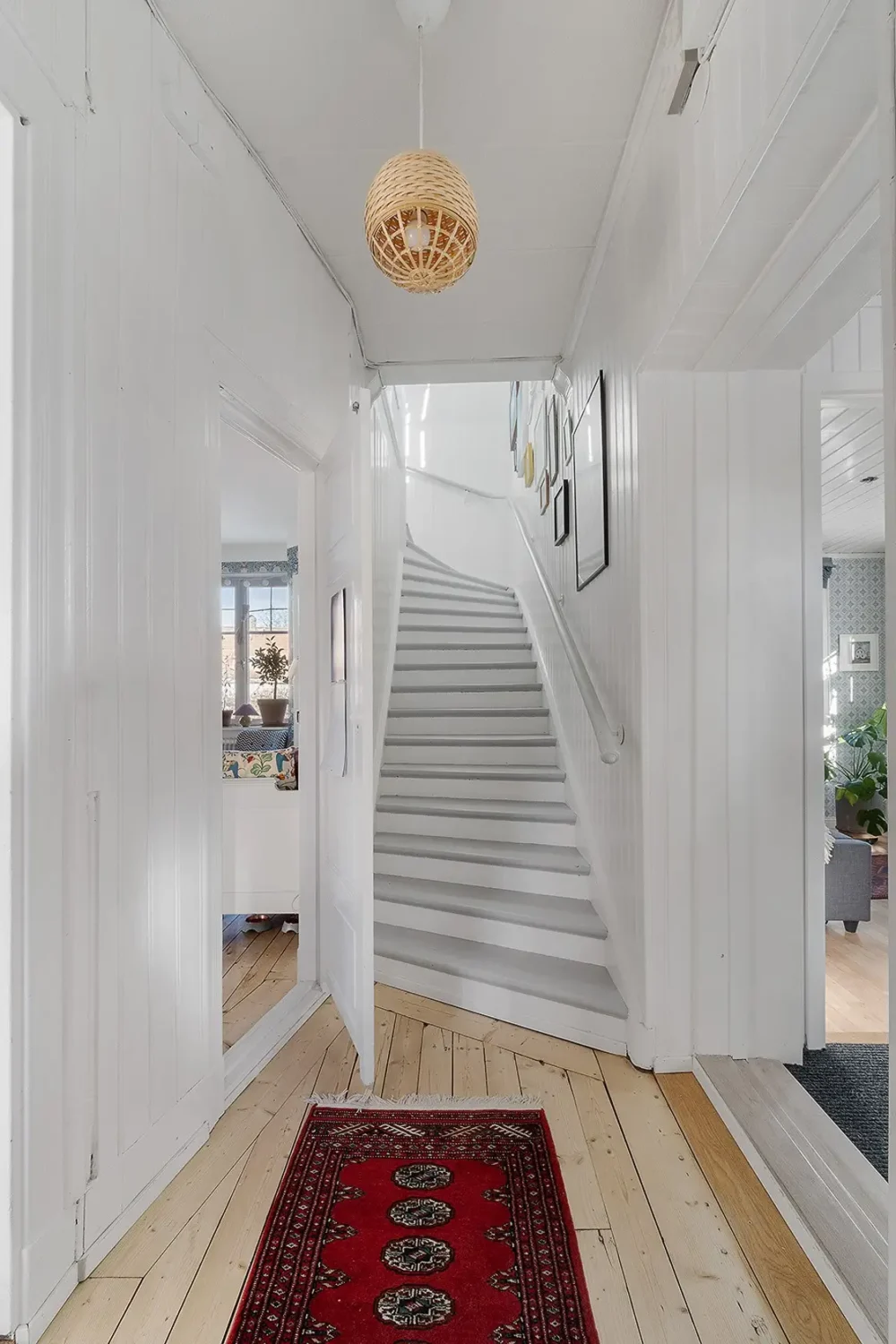 A Charming Early 20th-Century Family Home in Sweden 9 hall wooden floorboards stairs
