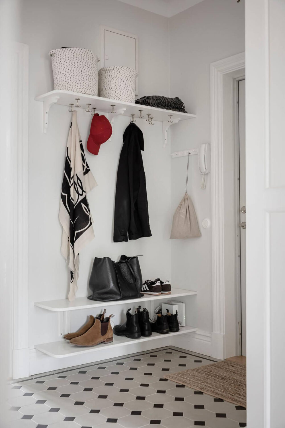 A Light Color Palette in a Stylish Renovated Late 19th Century Apartment 31 hat and shoe shelves A Light Color Palette in a Stylish Renovated Late 19th Century Apartment