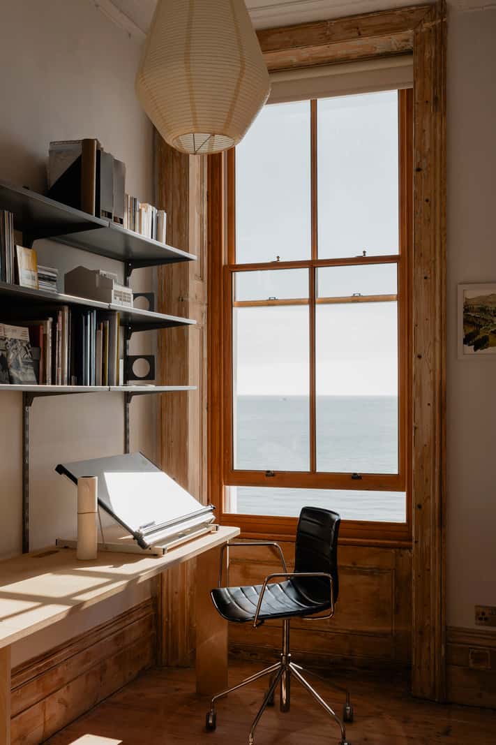 Bespoke Furniture in a Restored Seaside Apartment in England 12 home office large window facing the sea