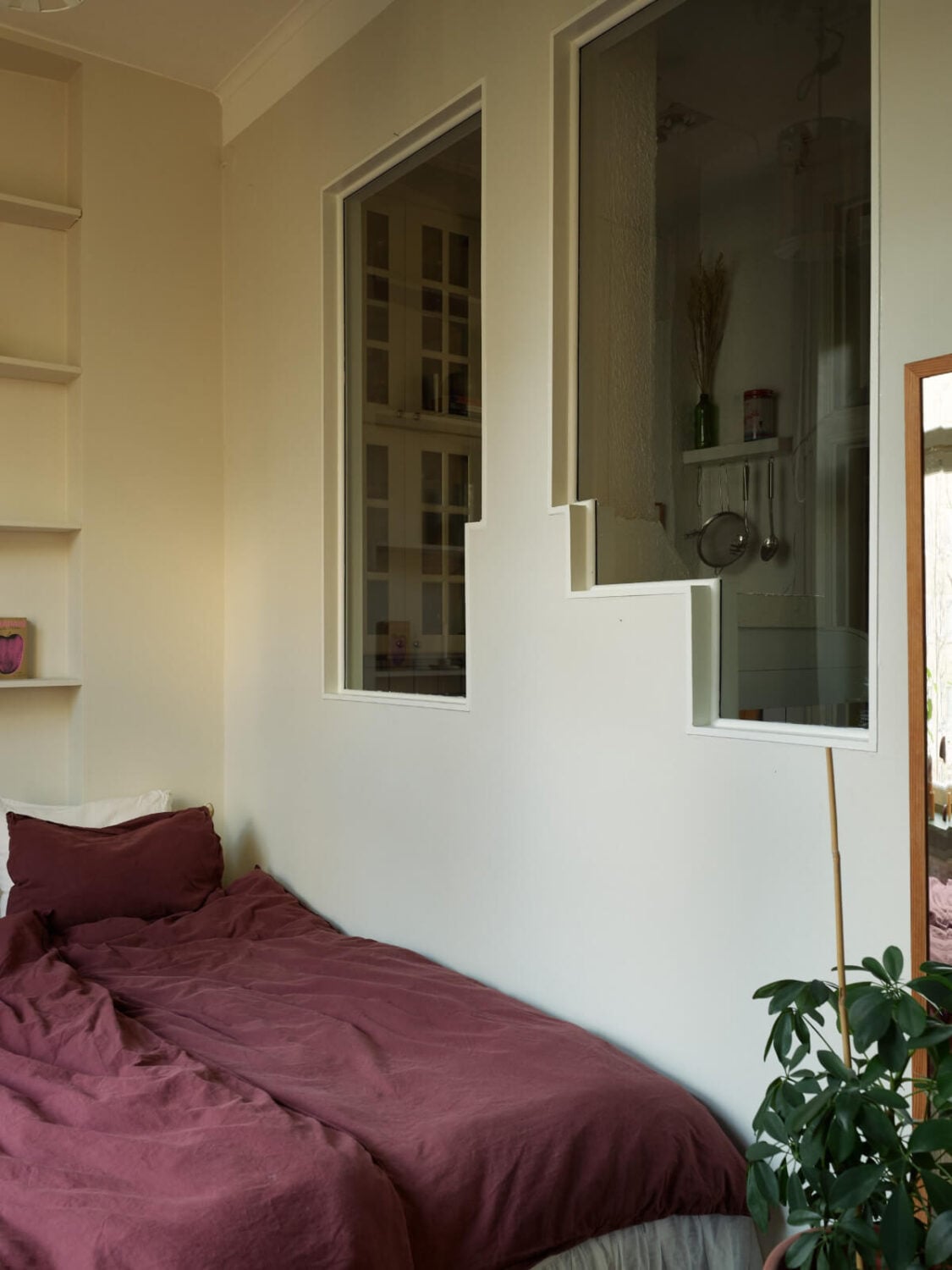 A Muted Color Palette and Smart Storage in a Small Stockholm Apartment 11 indoor windows