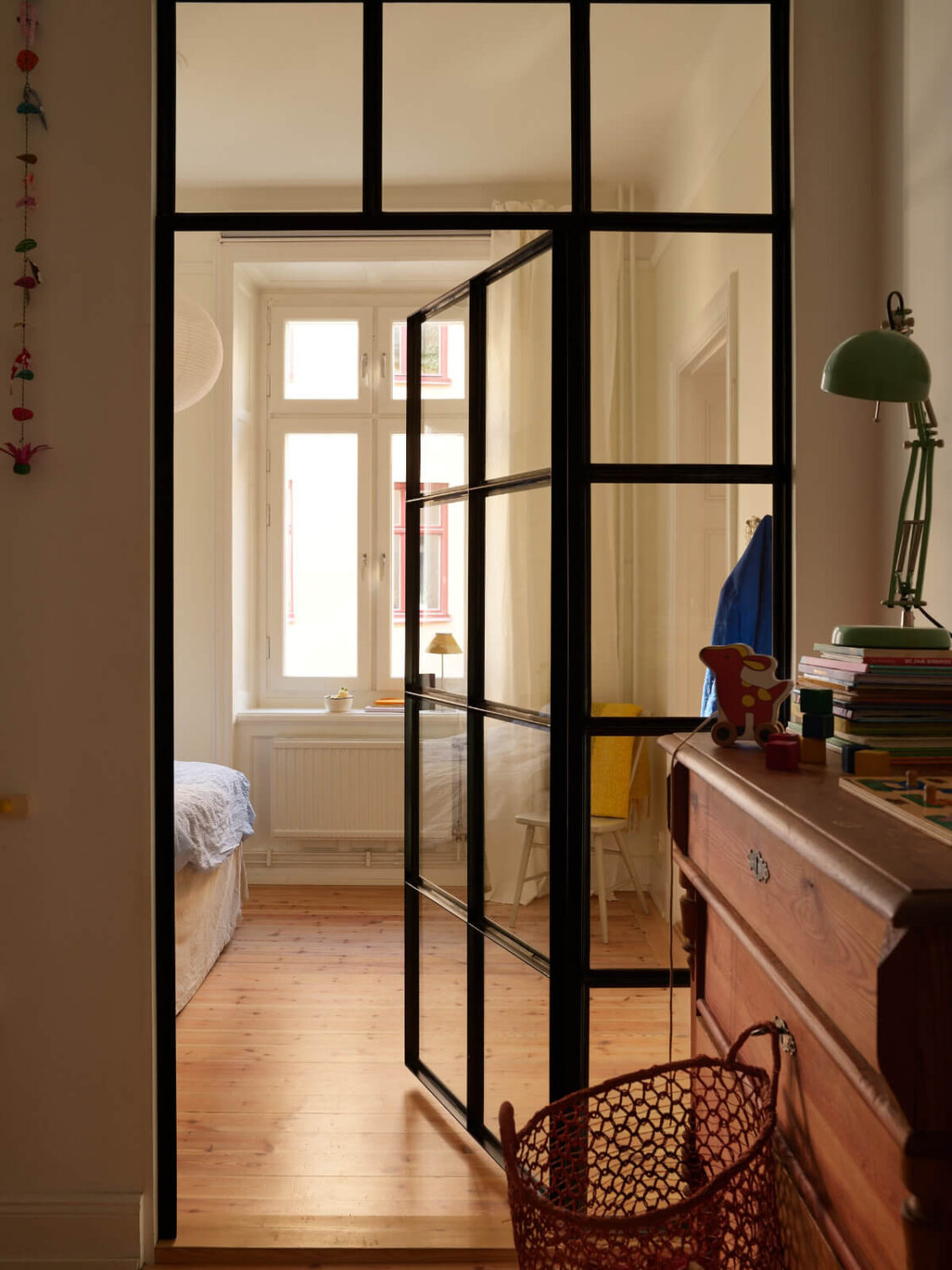 Revisiting a Bright Scandi Apartment with a Gray Kitchen 20 industrial door