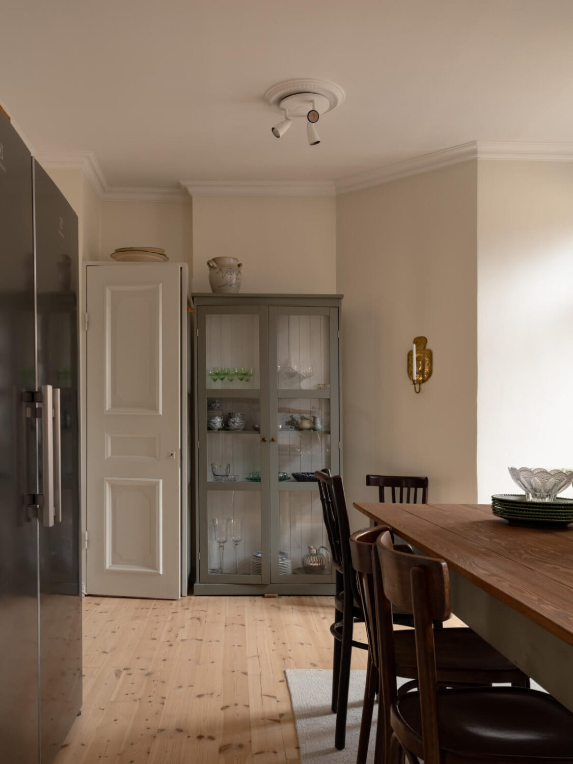 Soft Color Tones in a Renovated Turn-of-the-Century Apartment 13 kitchen beige walls wooden floor