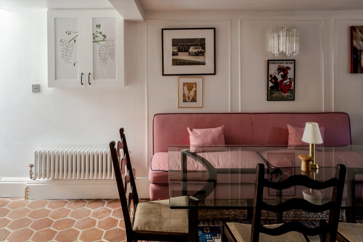 Color, Pattern, and Textures in a Renovated London Townhouse 11 kitchen dining area glass table pink built-in bench nordroom