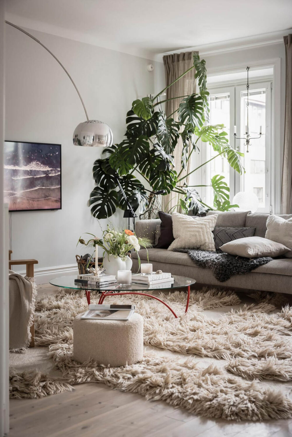A Light Color Palette in a Stylish Renovated Late 19th Century Apartment 2 light sitting room large rug