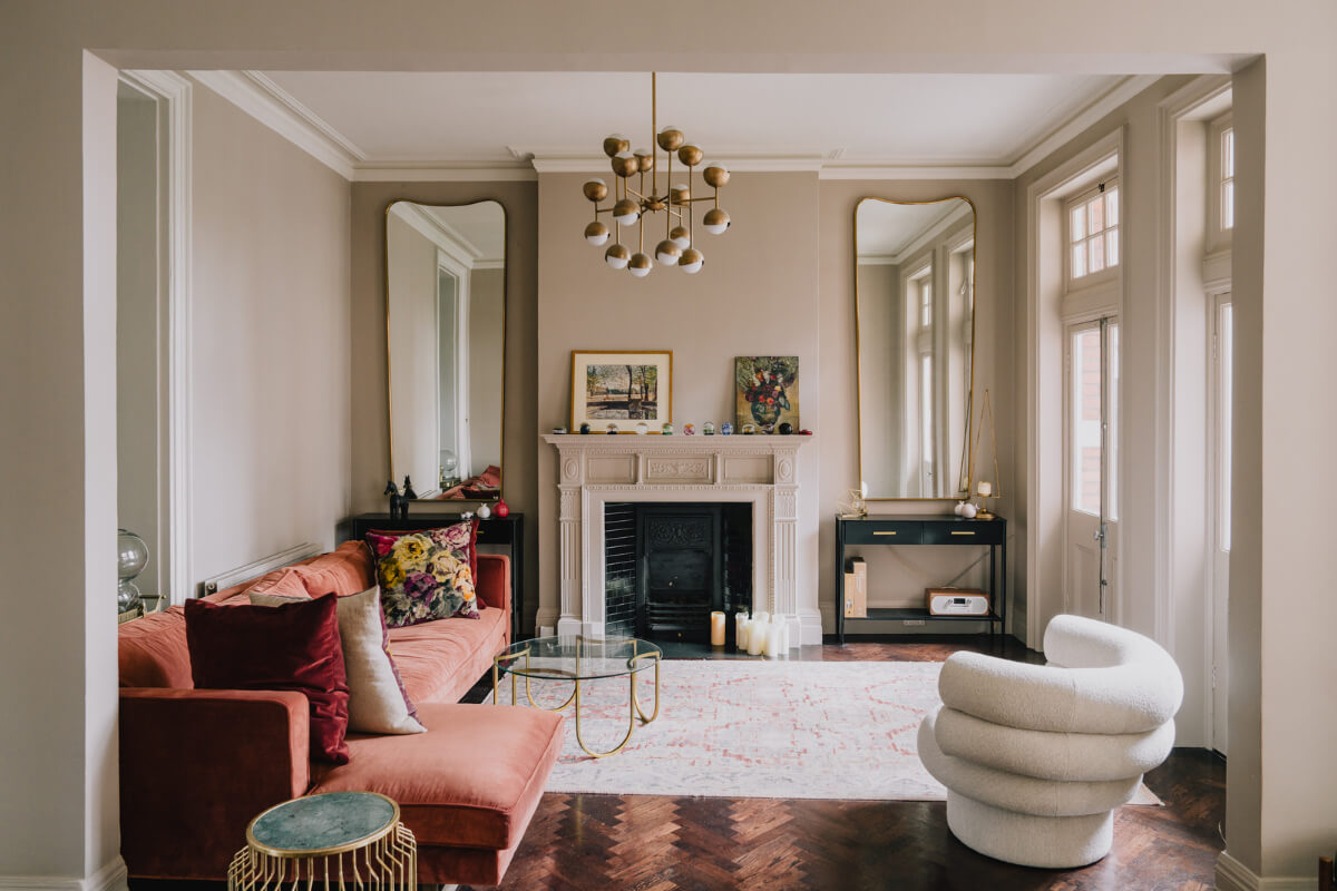 A Stunning Edwardian Apartment with High Ceilings and Period Details 2 living room fireplace large mirrors