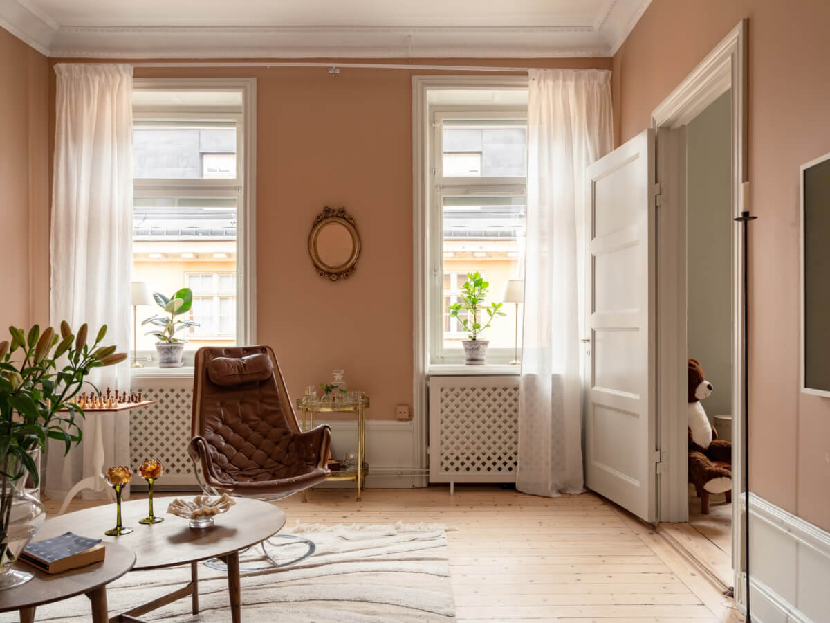 Soft Color Tones in a Renovated Turn-of-the-Century Apartment 3 living room large windows