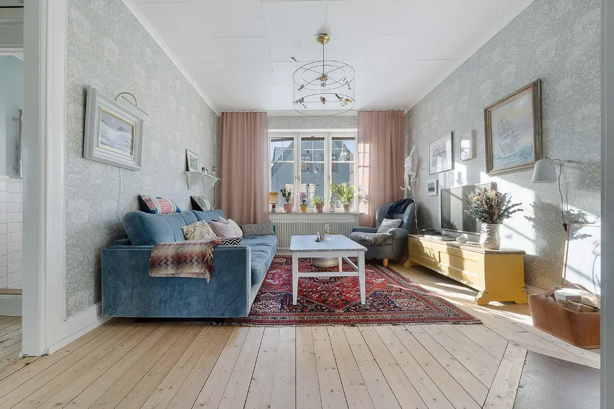 A Charming Early 20th-Century Family Home in Sweden 2 living room with wallpaper