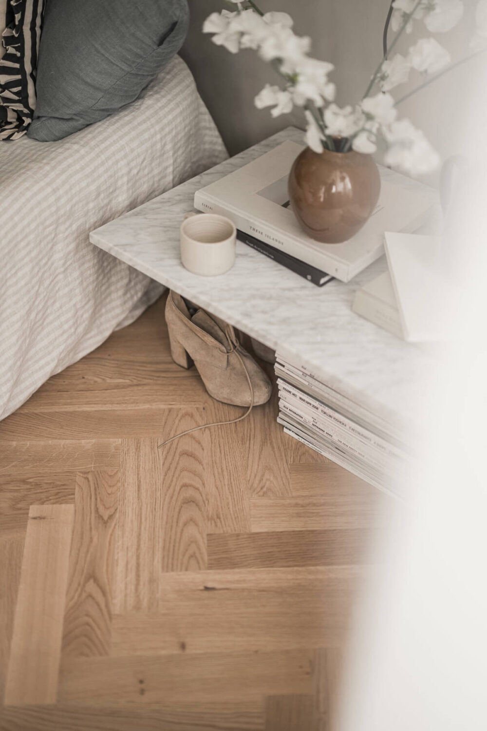 A Light-Filled Contemporary Swedish Apartment 17 marble nightstand