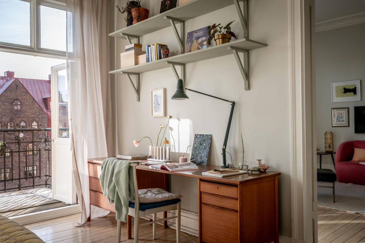 A Light and Spacious Apartment with a Cozy Social Kitchen 11 midcentury desk with shelves