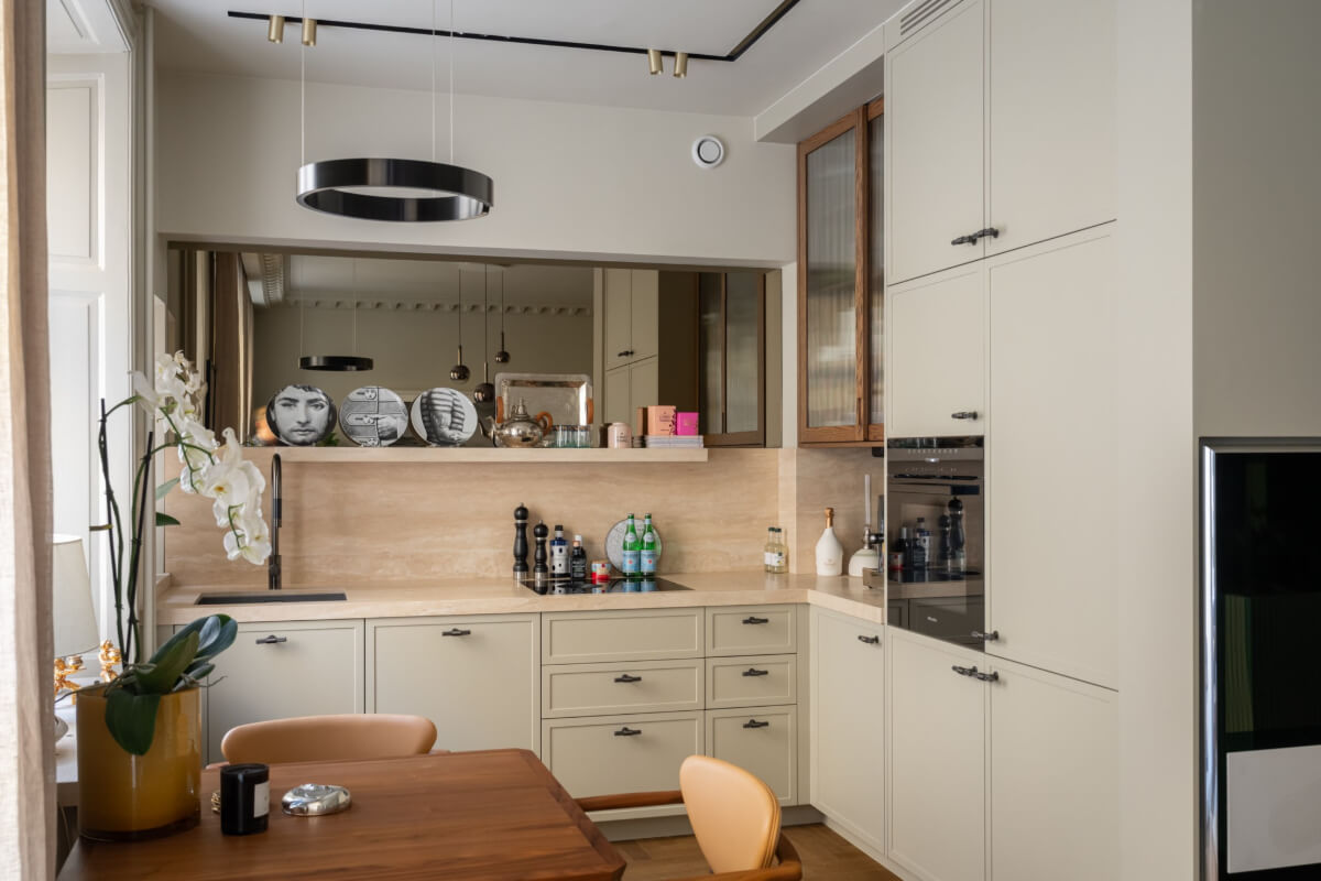 Hotel-Style Interiors in a Late 19th Century Apartment in Stockholm 8 mirror wall kitchen
