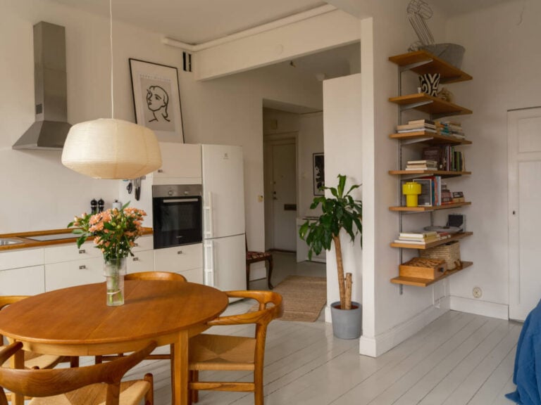 Image showcasing A Studio Apartment with an Exposed Brick Wall - The Nordroom