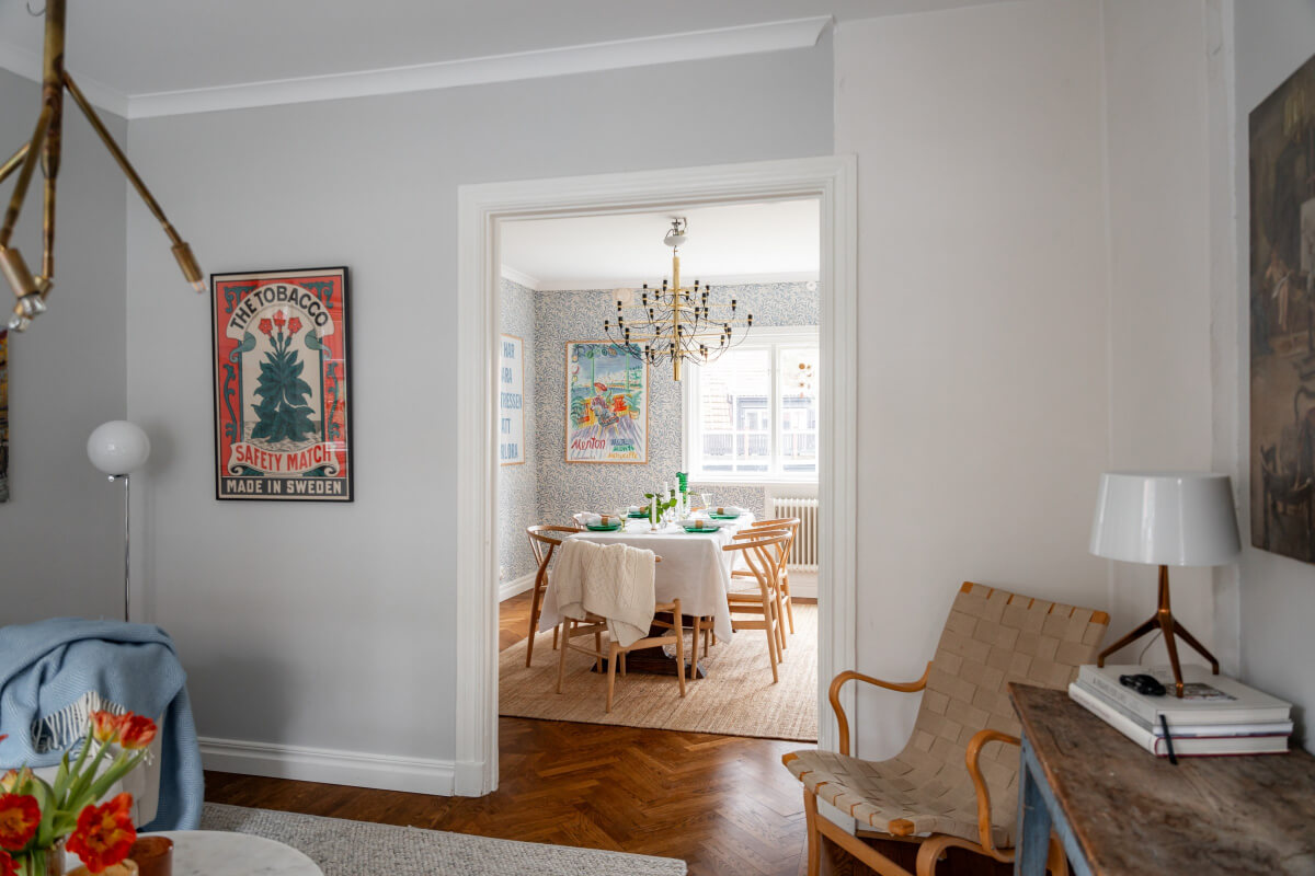 Turn-of-the-Century Charm Meets Modern Comfort in a Swedish House 6 open doorway to dining room