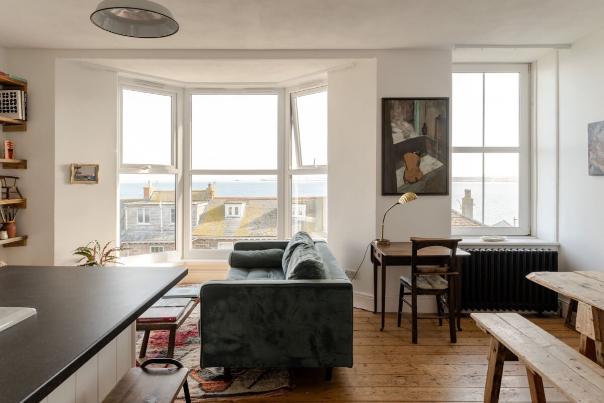 A Small Victorian Apartment by the Sea in Cornwall 5 open plan living room bay window