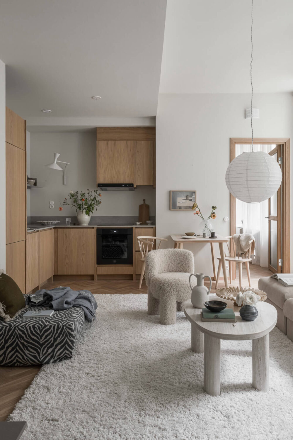A Light-Filled Contemporary Swedish Apartment 3 open plan living space wooden kitchen