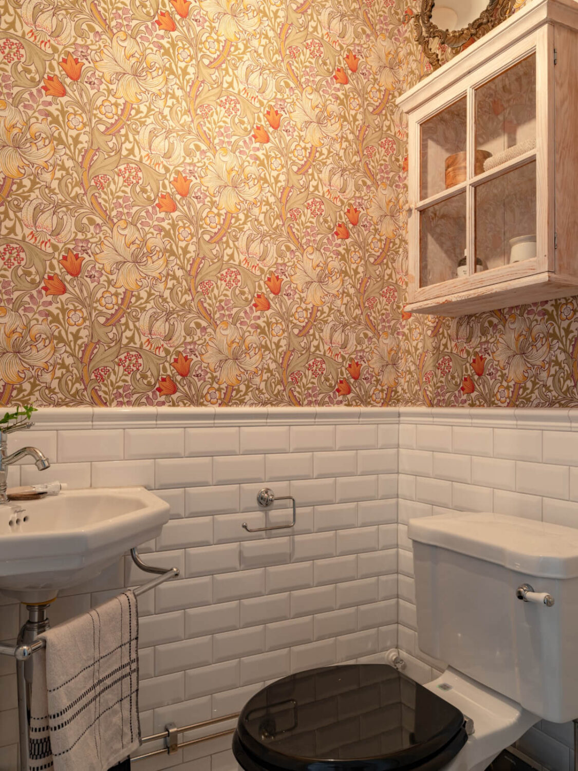 Soft Color Tones in a Renovated Turn-of-the-Century Apartment 27 powder room with wallpaper