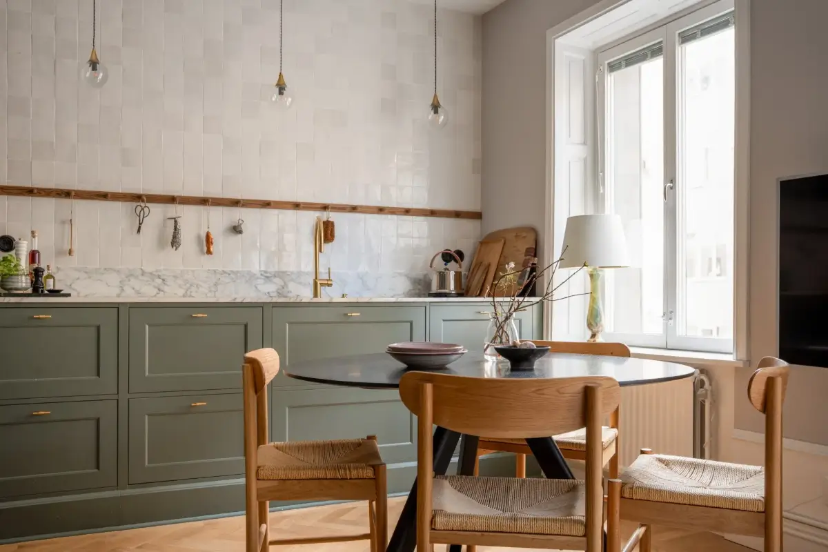 A Green Kitchen in a Classic Scandinavian Apartment 10 round dining table green kitchen