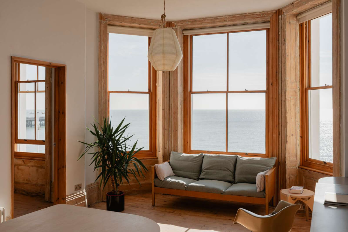 Bespoke Furniture in a Restored Seaside Apartment in England 1 seaside apartment bay window
