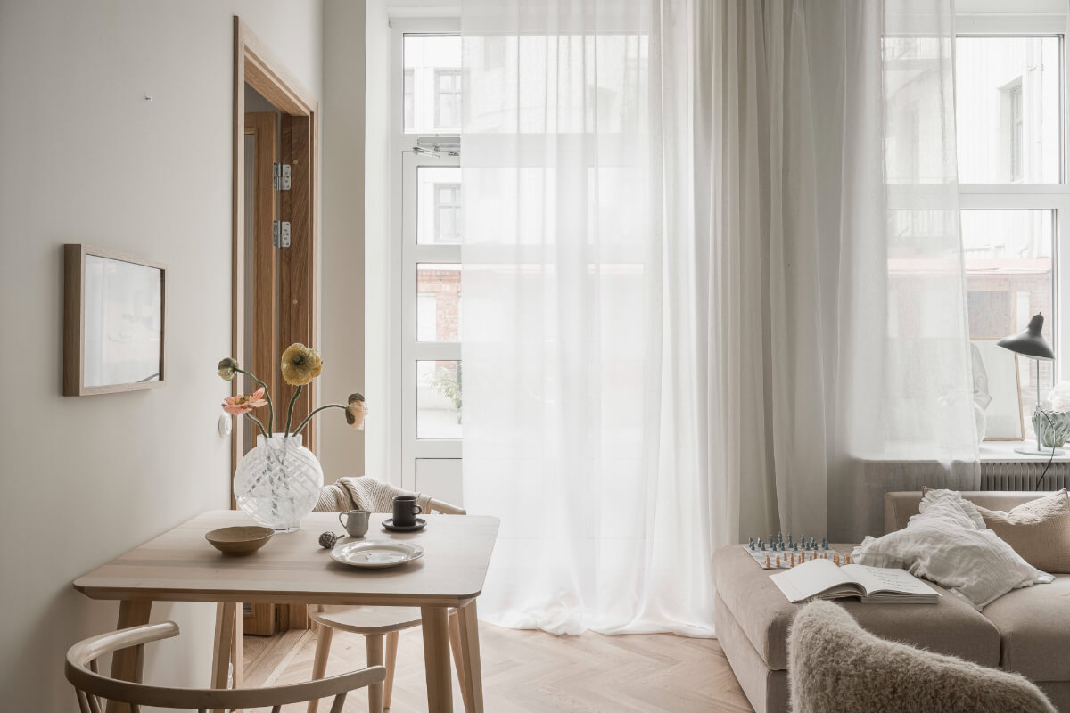 A Light-Filled Contemporary Swedish Apartment 9 sheer white curtains
