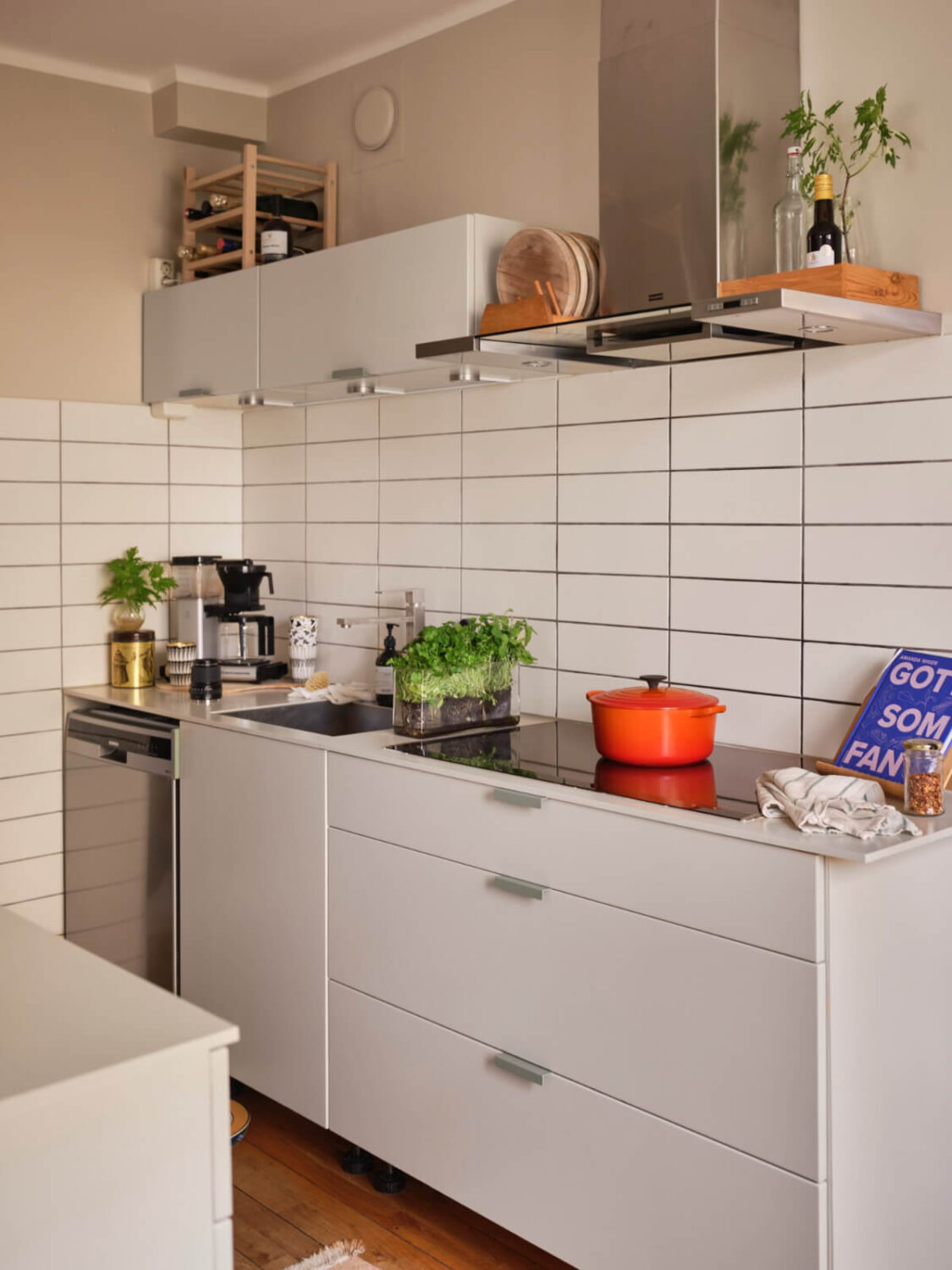 A Corner Apartment with Period Features and Bright Color Pops 9 simple white kitchen