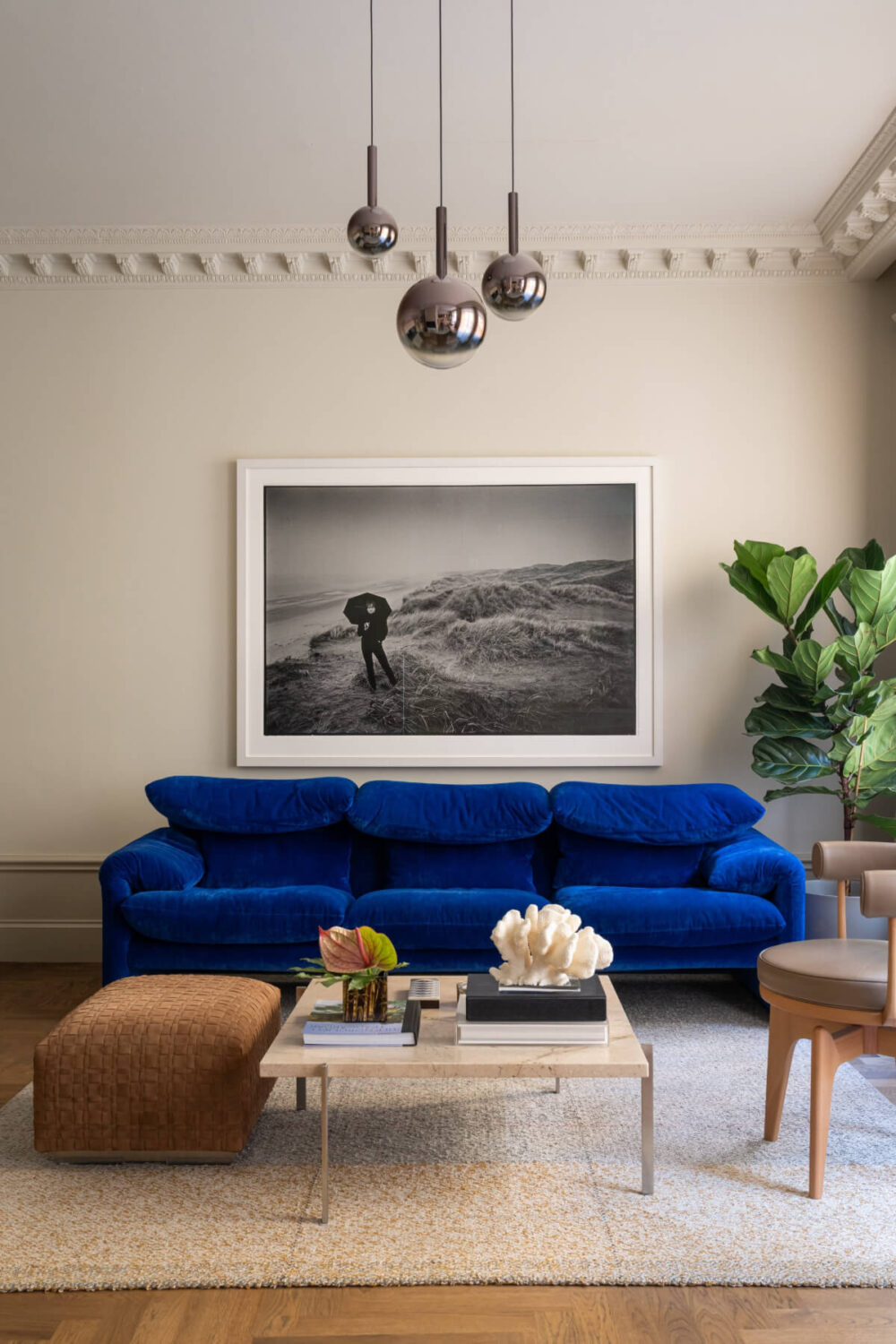 Hotel-Style Interiors in a Late 19th Century Apartment in Stockholm 3 sitting room blue sofa