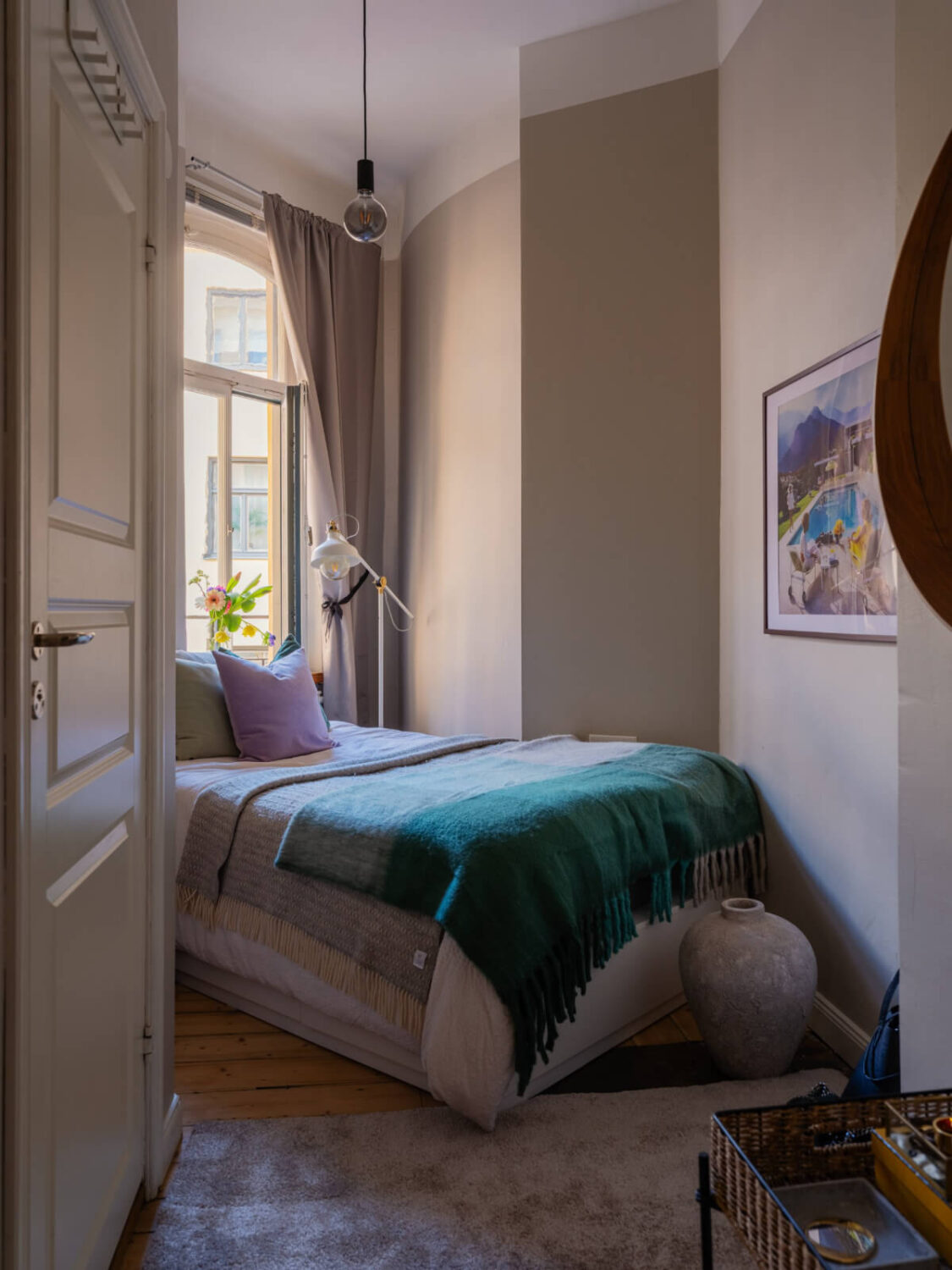 A Small Apartment with Contemporary Furniture in a 19th-Century Building 17 small bedroom angled walls