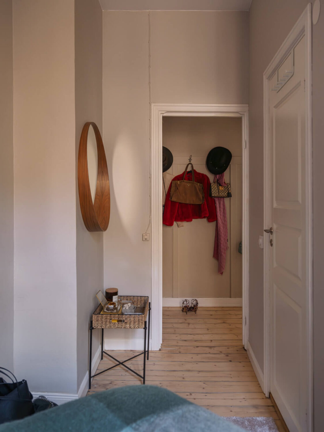 A Small Apartment with Contemporary Furniture in a 19th-Century Building 21 small bedroom built-in wardrobe round mirror