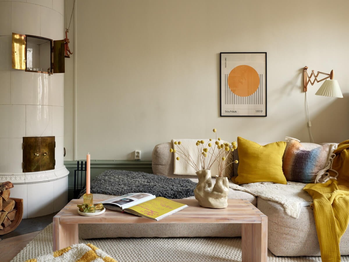 A Muted Color Palette and Smart Storage in a Small Stockholm Apartment 4 small living room with fireplace