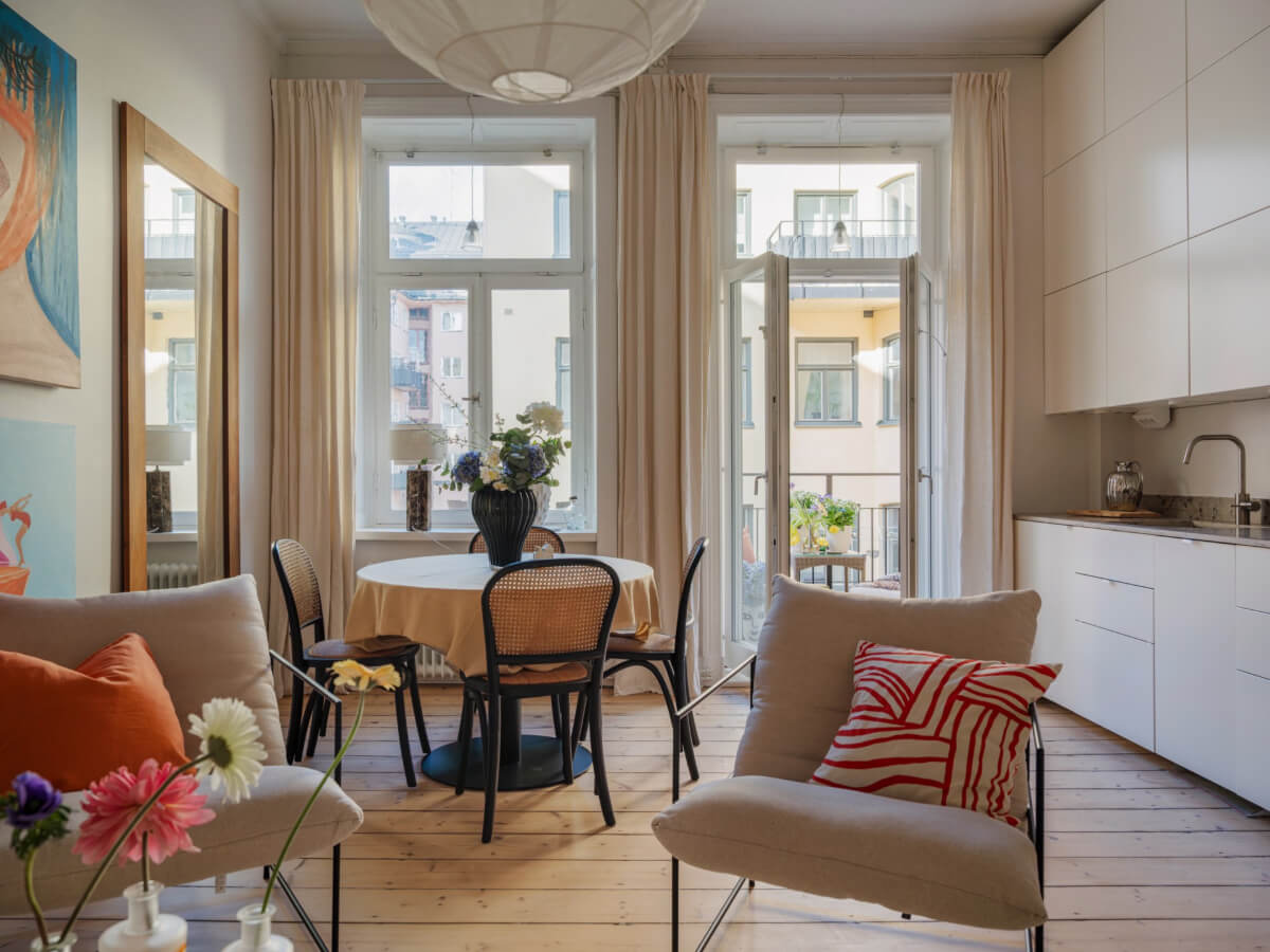 A Small Apartment with Contemporary Furniture in a 19th-Century Building 3 small living room wooden floor white kitchen