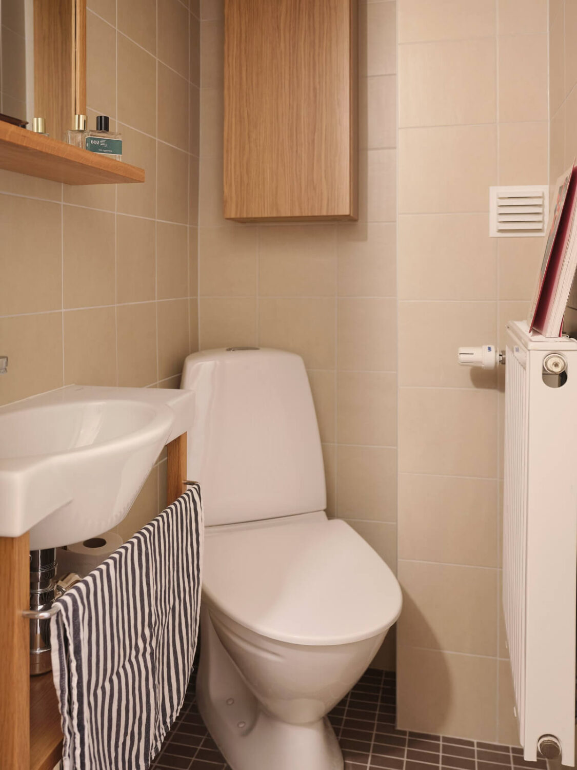 A Corner Apartment with Period Features and Bright Color Pops 16 small powder room A Corner Apartment with Period Features and Bright Color Pops