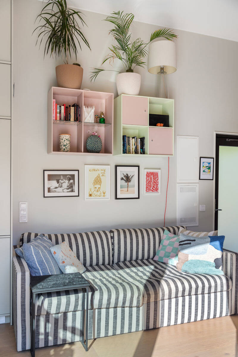 A Modern Tiny House in the Swedish Archipelago 6 striped sofa pastel colored cabinets A Modern Tiny House in the Swedish Archipelago