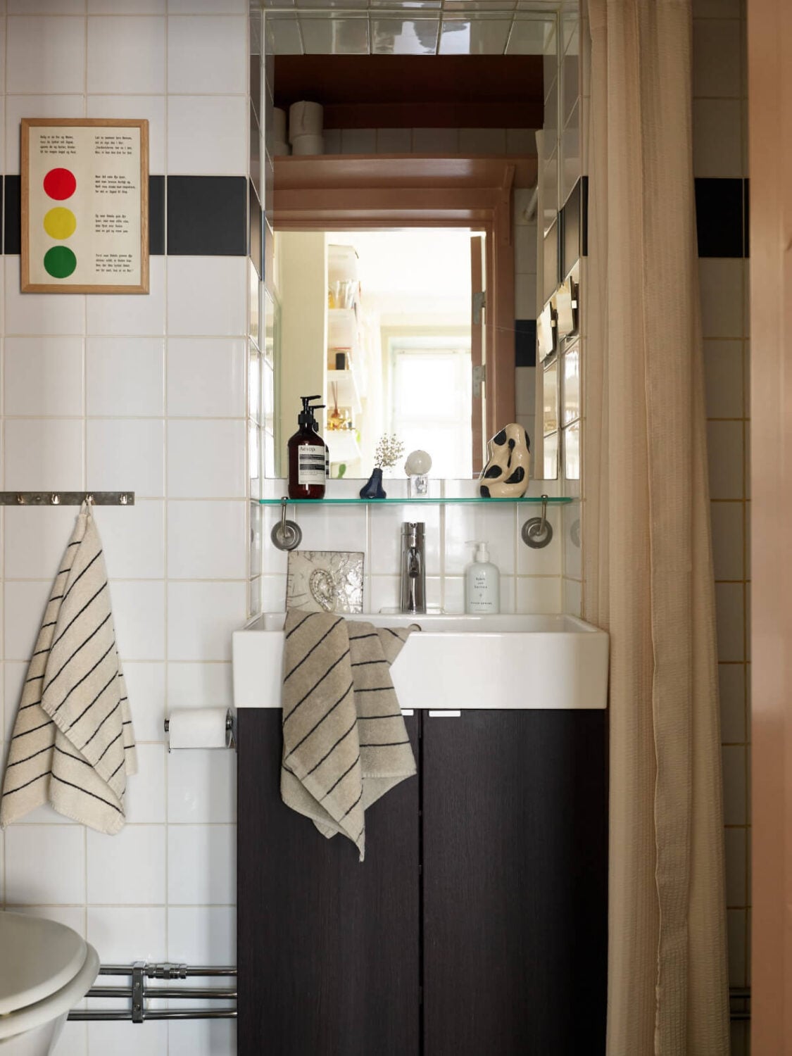A Muted Color Palette and Smart Storage in a Small Stockholm Apartment 18 tiny bathroom