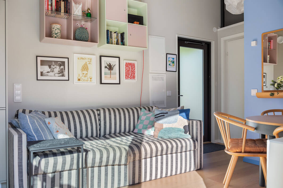 A Modern Tiny House in the Swedish Archipelago 3 tiny house striped sofa