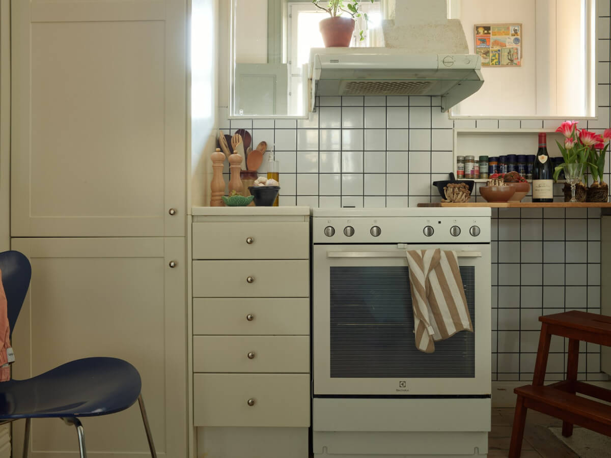 A Muted Color Palette and Smart Storage in a Small Stockholm Apartment 15 tiny kitchen detail