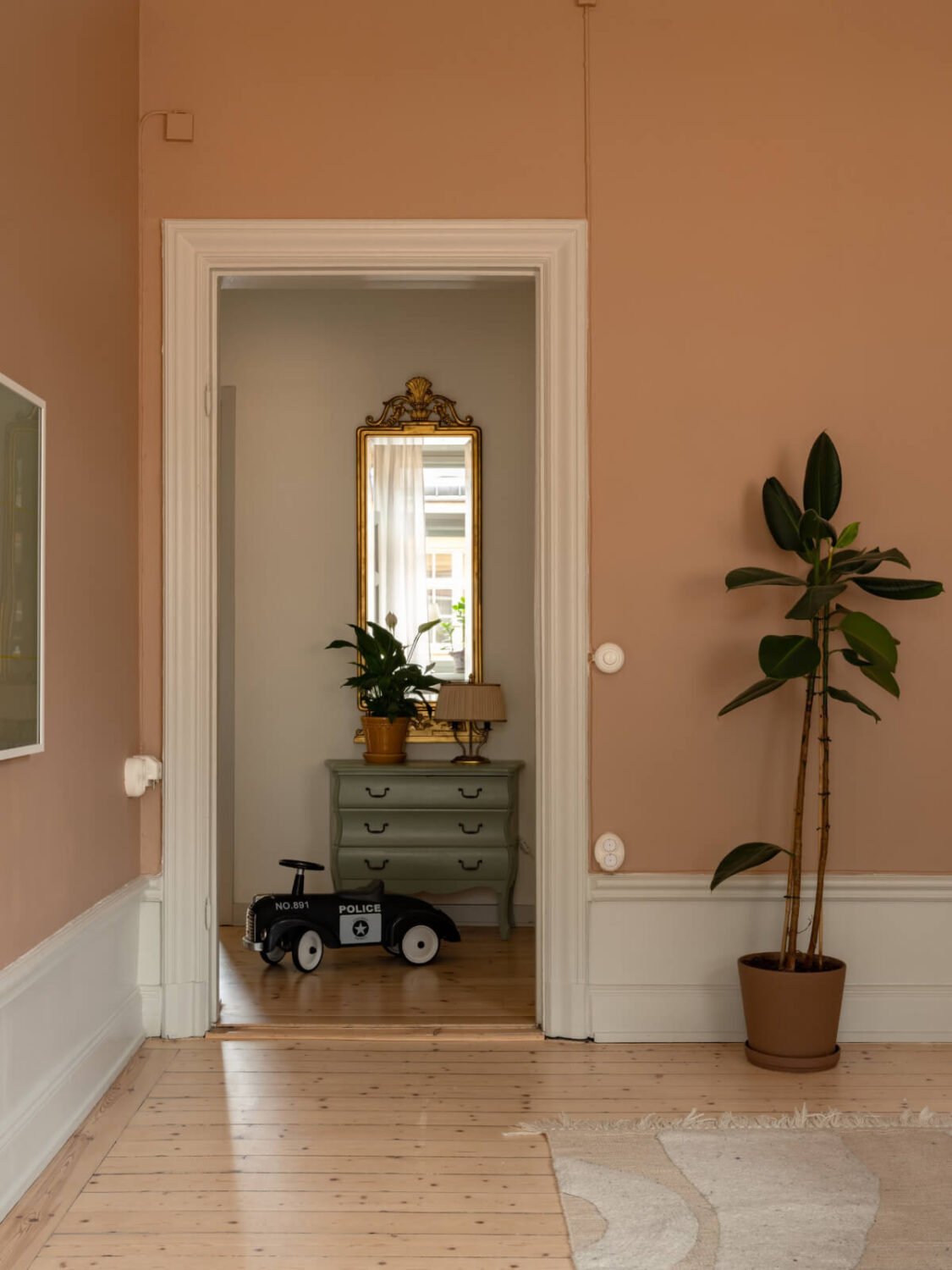 Soft Color Tones in a Renovated Turn-of-the-Century Apartment 5 view into hall