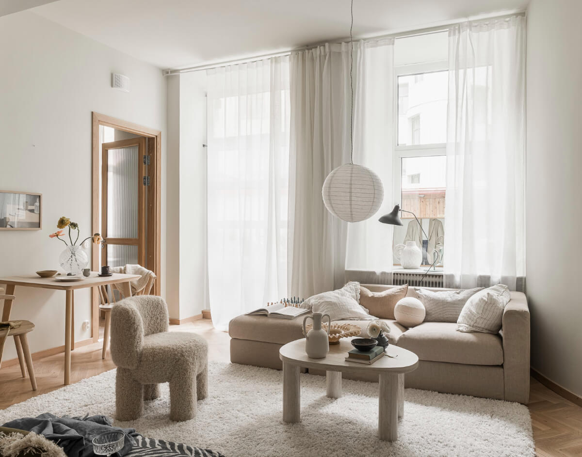 A Light-Filled Contemporary Swedish Apartment 2 white and gray scandi living room